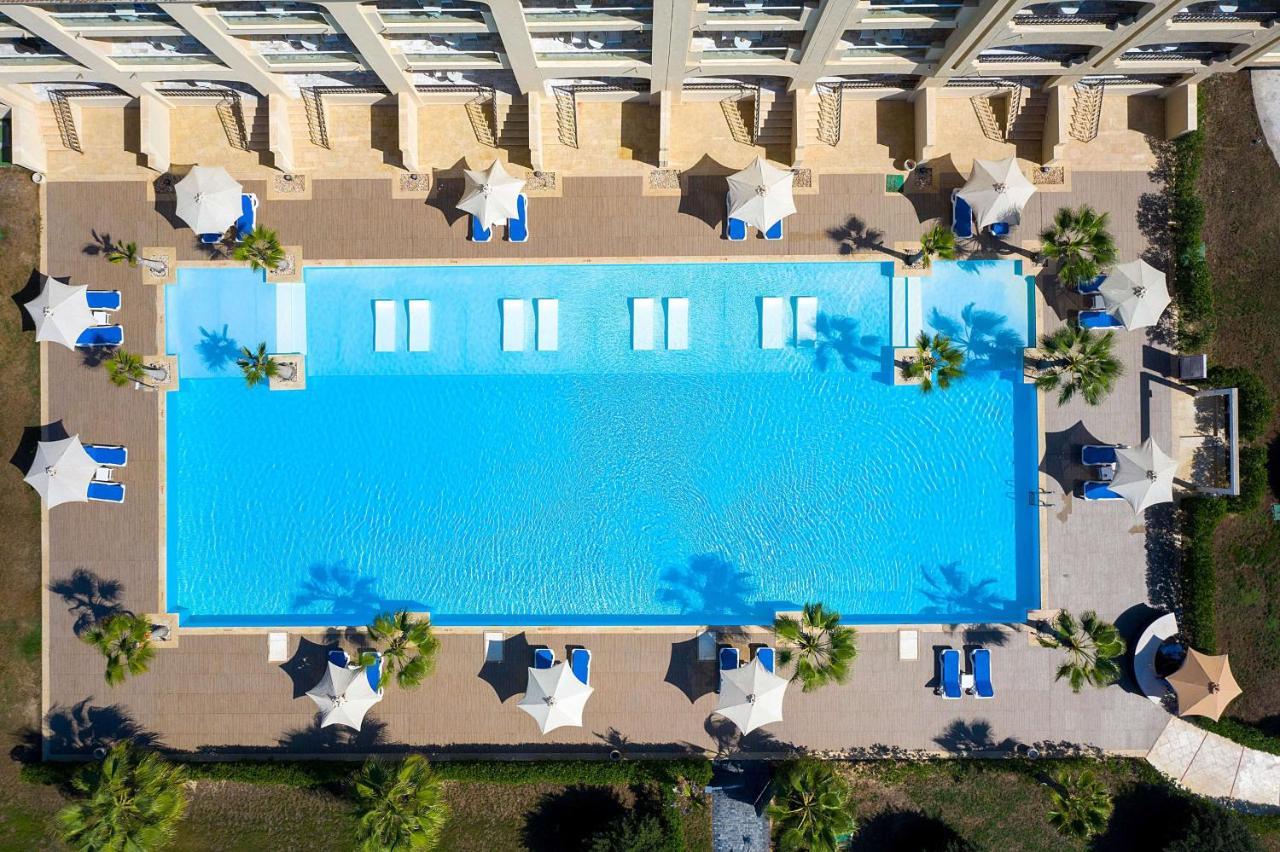 Rixos Alamein - Full Board Plus El Alamein Ngoại thất bức ảnh Aerial view of the pool at the Hilton Mauritius Resort