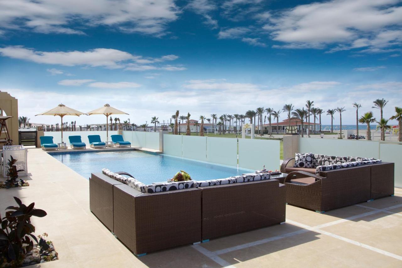 Rixos Alamein - Full Board Plus El Alamein Ngoại thất bức ảnh The pool at the Hilton Sharm El Sheikh