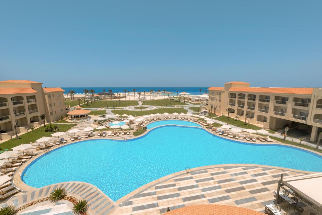Rixos Alamein - Full Board Plus El Alamein Ngoại thất bức ảnh A pool at a resort in Egypt
